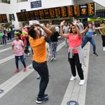 Audiences dancing in New Street Station