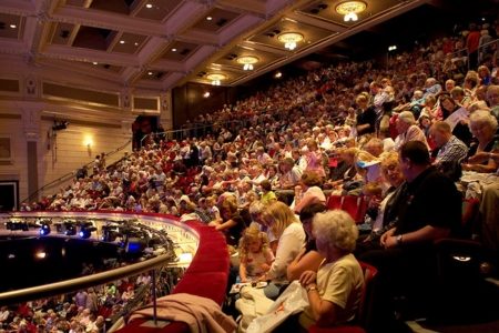 Audience seated in the auditorium.